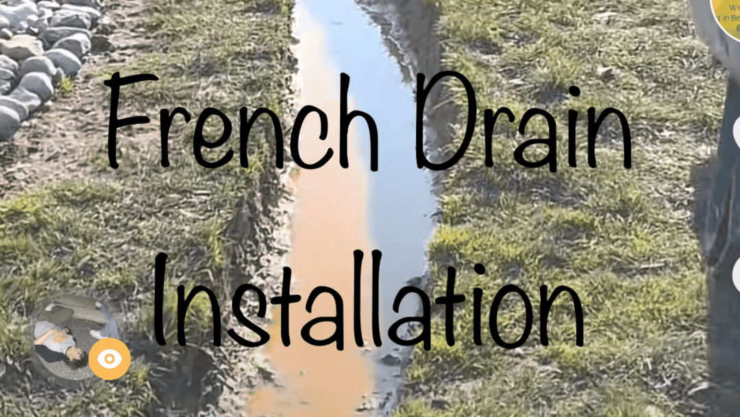French drain installation process with water flow visible in a landscaped area.